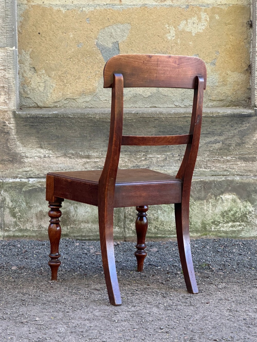 A set of four Victorian birch side chairs featuring curved top rails, turned front legs, and solid timber seats. View IX