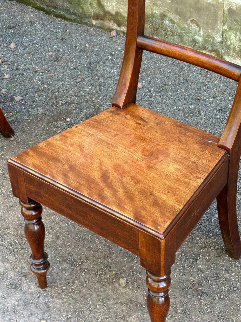 A set of four Victorian birch side chairs featuring curved top rails, turned front legs, and solid timber seats. View X