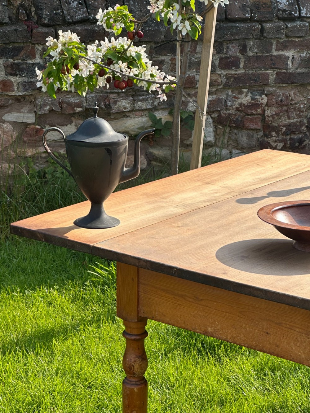 A 19th-century pine kitchen preparation table featuring turned legs, a single frieze drawer with a wooden knob, and a drop-leaf extension. View VIII