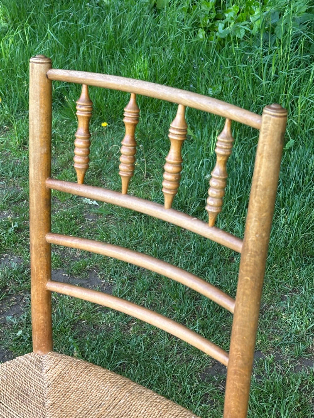 A pair of 19th century beech and ash Sussex chairs, very likely made for Morris & Co. View IV