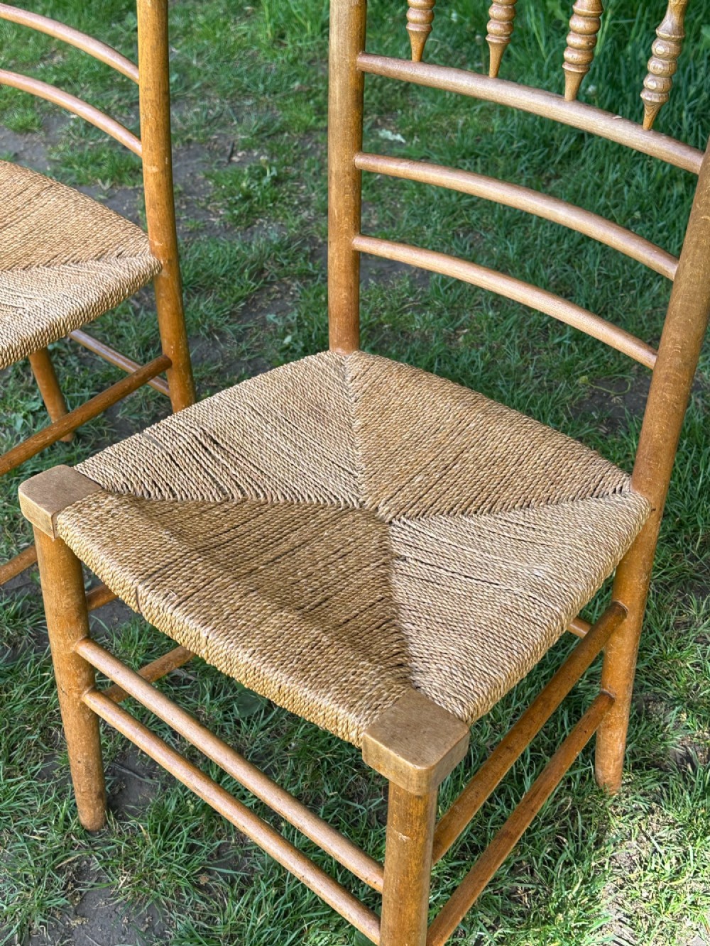 A pair of 19th century beech and ash Sussex chairs, very likely made for Morris & Co. View VI