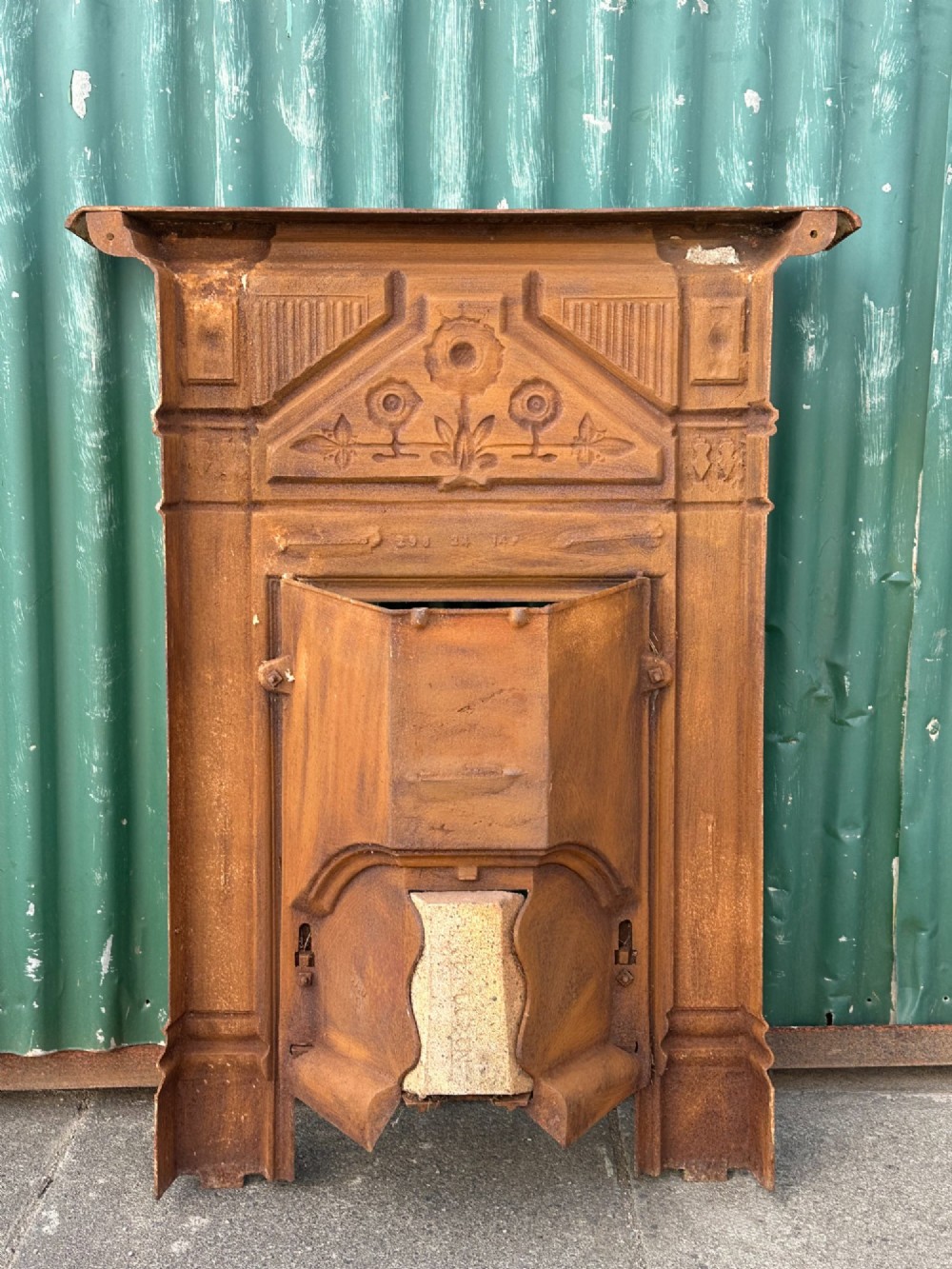 A Victorian Aesthetic Movement cast iron bedroom fire grate, c.1880's View V