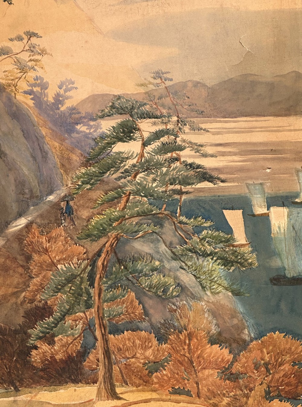 A late nineteenth-century two-panel folding screen featuring hand-painted Japanese coastal and mountainous landscapes framed in dark wood. View II