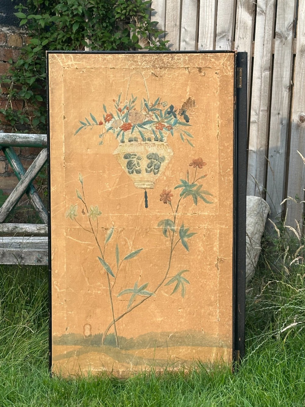 A late nineteenth-century two-panel folding screen featuring hand-painted Japanese coastal and mountainous landscapes framed in dark wood. View XI