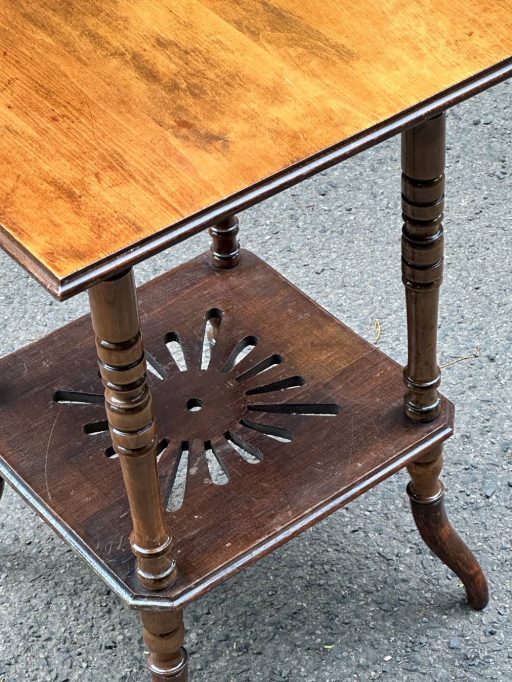 An Anglo-Japanese two-tier wooden occasional table featuring turned spindle legs, a square top, and a pierced lower shelf. View III
