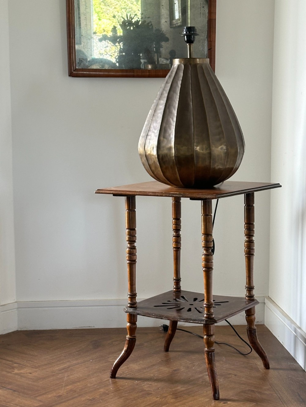 An Anglo-Japanese two-tier wooden occasional table featuring turned spindle legs, a square top, and a pierced lower shelf. View VI