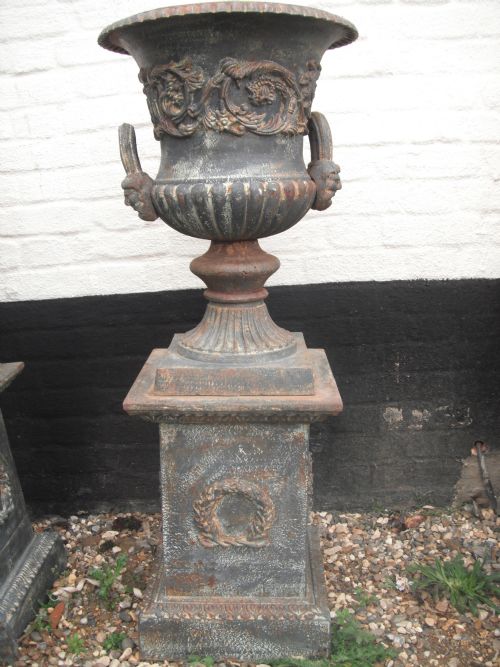 fig 1. 4 Matching Cast Iron Garden Urns on Stands