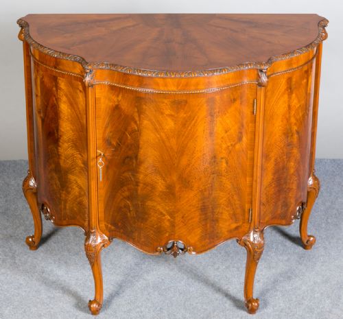 Figured Walnut Demi Lune Side Cabinet.
