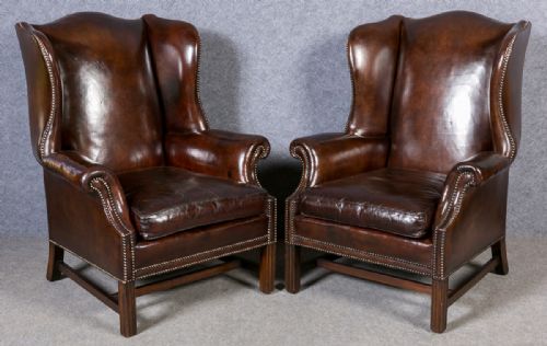 Pair Leather Wing Armchairs