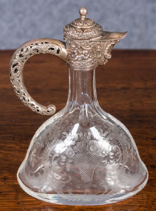 Silver & Glass Claret Jug.