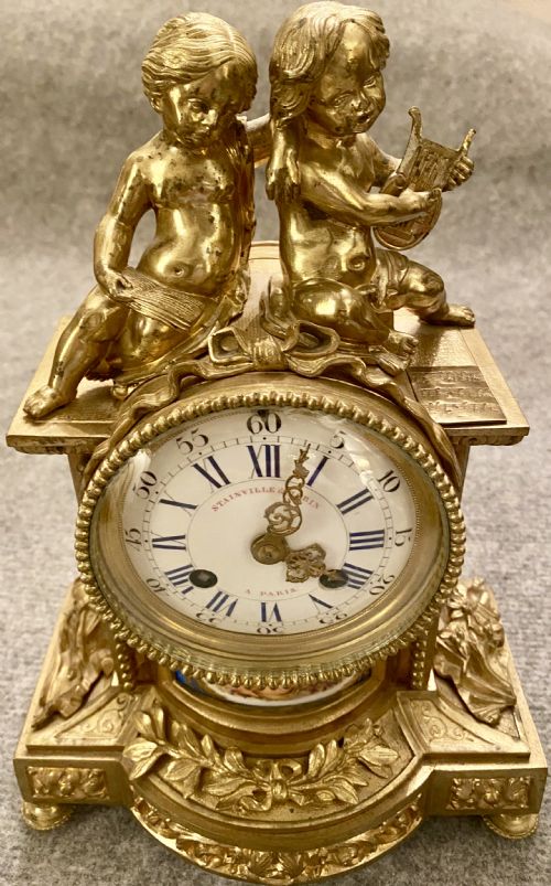 French Ormolu and Porcelain Mantle Clock