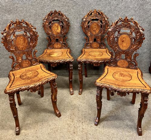 Unusual Set of 4 Black Forest Swiss Chairs