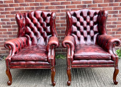 Pair of Georgian Style Leather Winged Armchairs