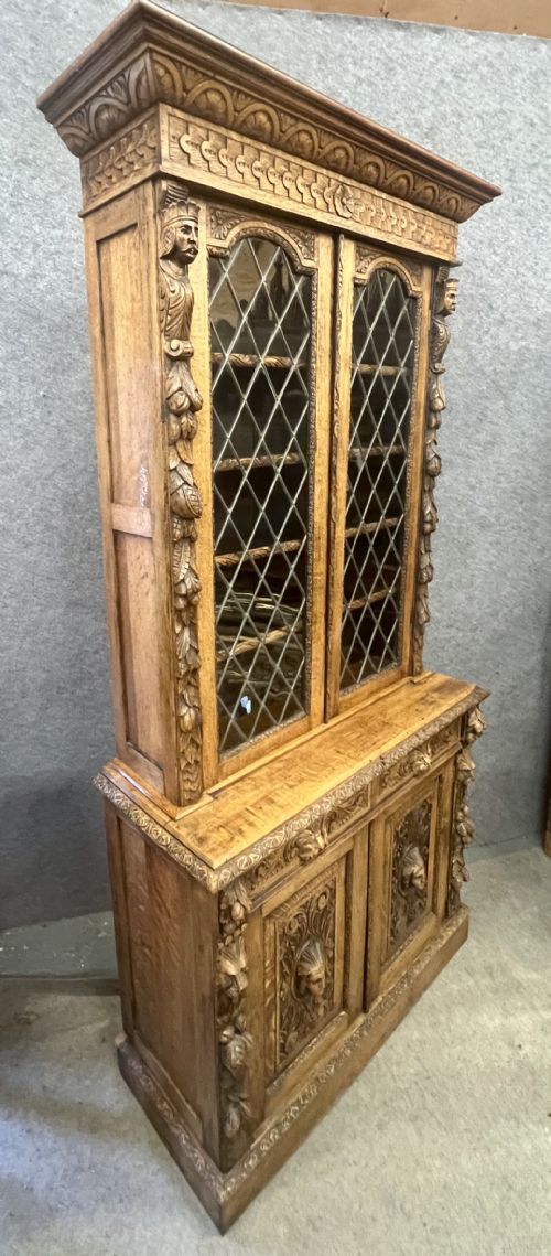 AN IMPRESSIVE 19THC CARVED OAK BOOKCASE - ADDITIONAL PHOTO 1