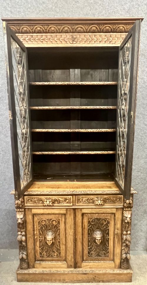 AN IMPRESSIVE 19THC CARVED OAK BOOKCASE - ADDITIONAL PHOTO 8