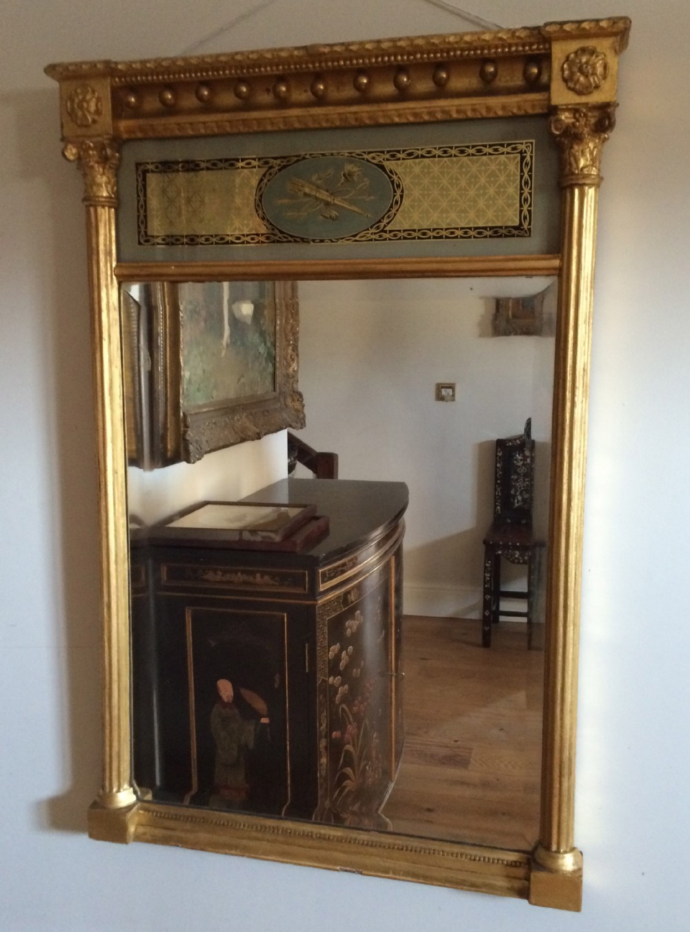 Regency Verre Eglomise Gilt Gesso Mirror.