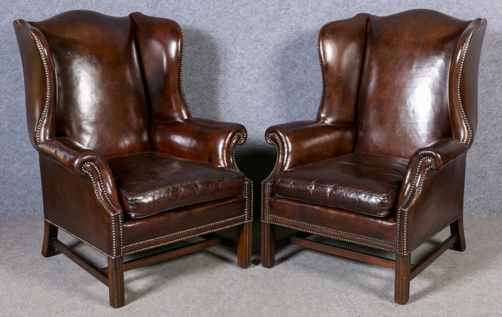 Pair Leather Wing Armchairs