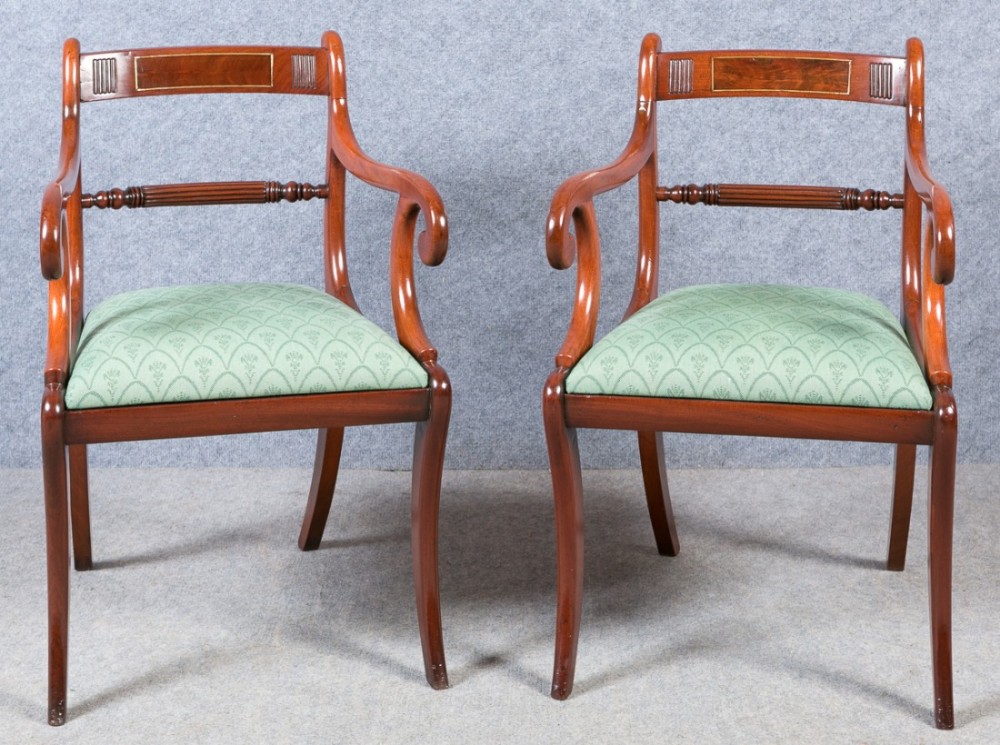 Elegant pair of Regency Elbow Chairs