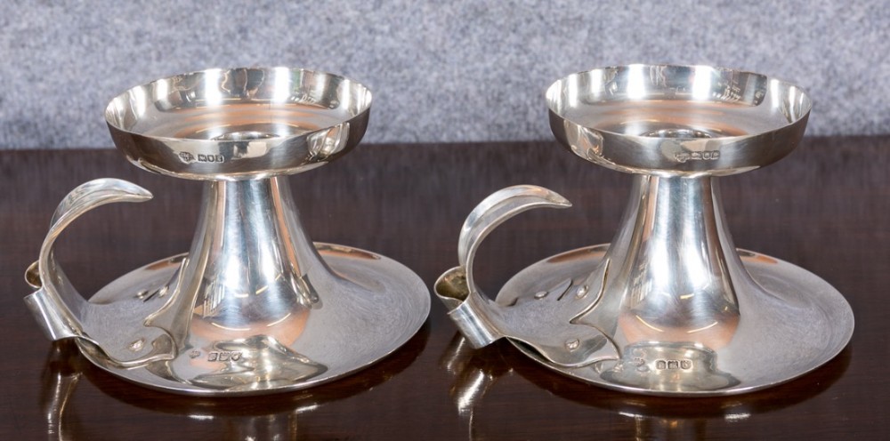 Pair Arts & Crafts Silver Candlesticks