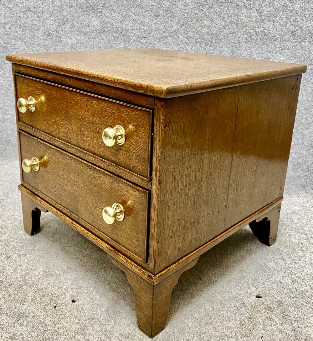 A Useful  Diminutive 2 Drawer Oak Chest View II