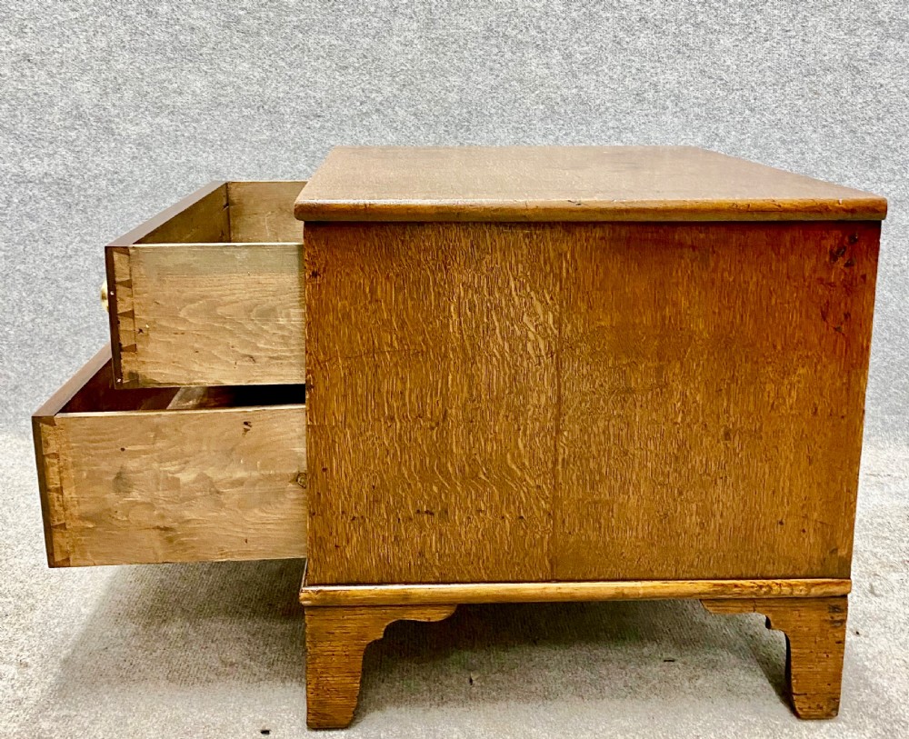 A Useful  Diminutive 2 Drawer Oak Chest View III