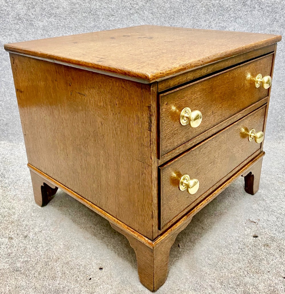 A Useful  Diminutive 2 Drawer Oak Chest View IV