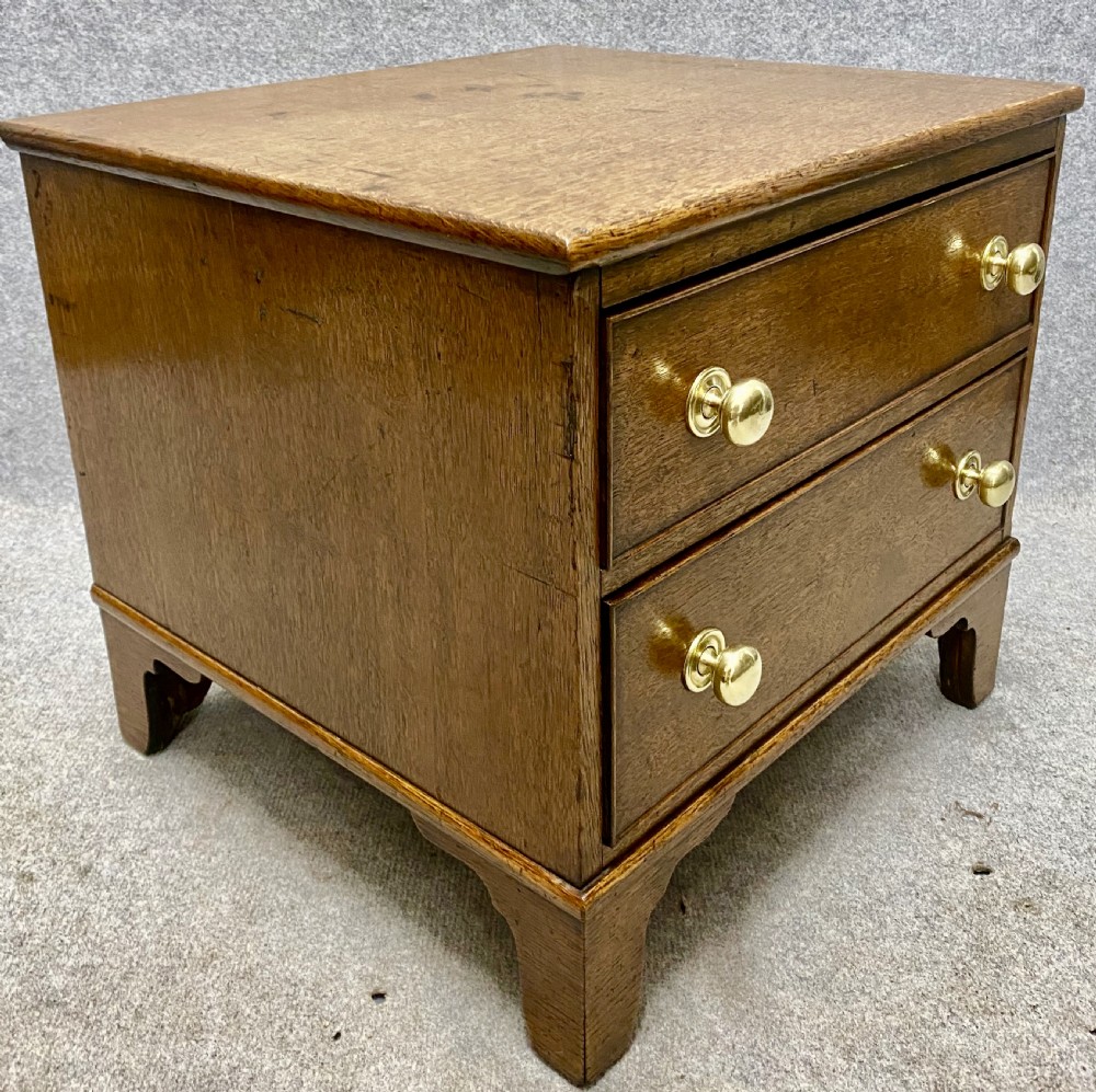 A Useful  Diminutive 2 Drawer Oak Chest View V