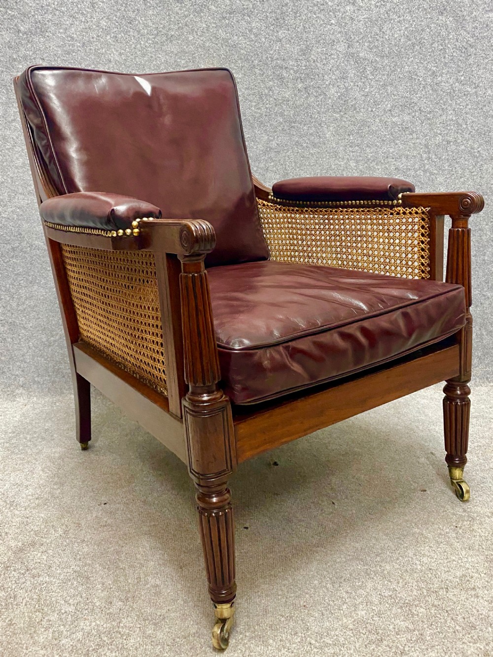 Regency mahogany bergere library armchair