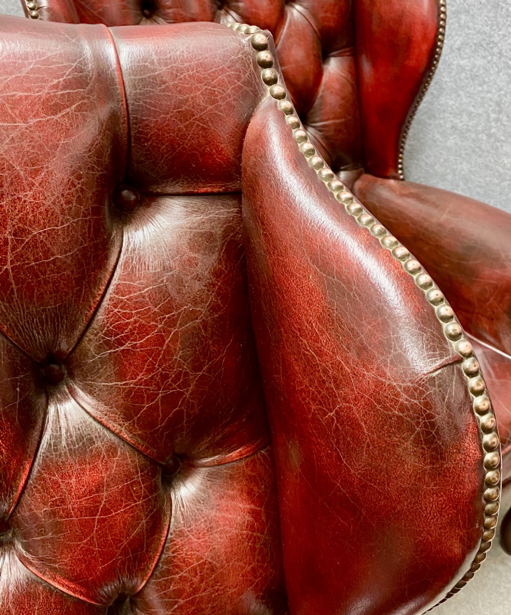 Pair of Leather Wing Armchairs View V