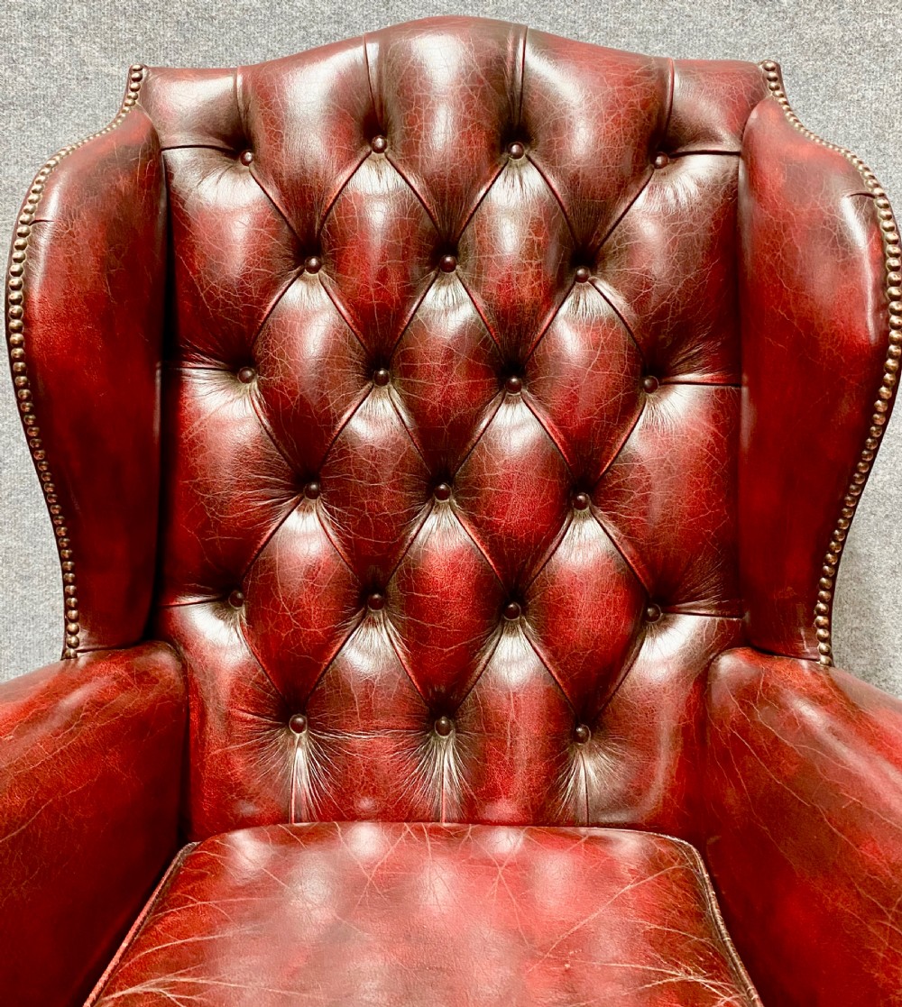 Pair of Leather Wing Armchairs View VIII