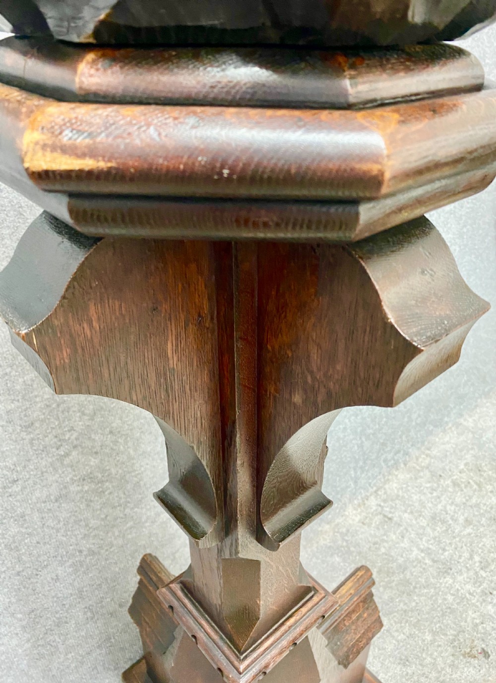 A dark carved oak eagle lectern featuring a sculpture of an eagle with wings spread mounted on an architectural pedestal stand. View XIV