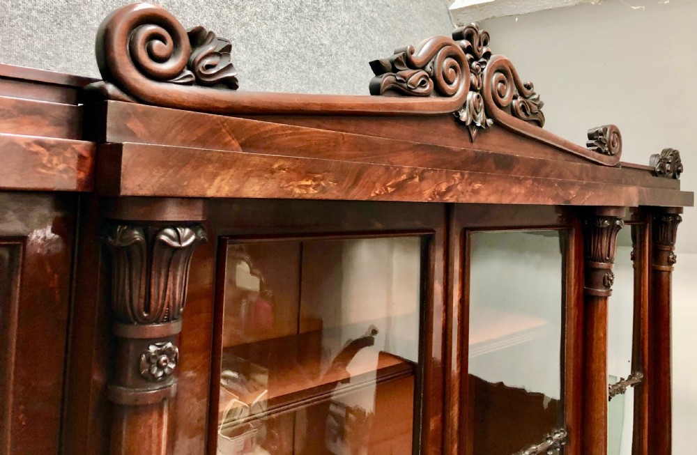 A French Chinoiserie marquetry commode featuring curved doors with inlaid pictorial scenes, a marble top, and gilt bronze mounts on cabriole legs. View XIII