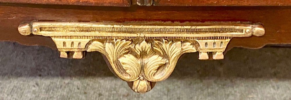 A French Louis XV style glazed display cabinet featuring serpentine glass side panels, a marble top, gilt bronze ormolu mounts, and hand-painted Vernis Martin panels at the base. View IX