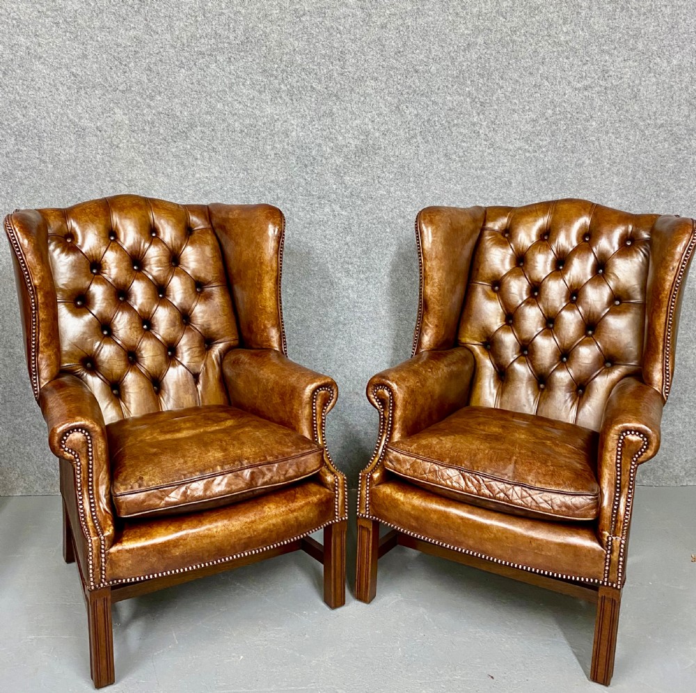 Pair of Georgian Style Leather Wing Armchairs
