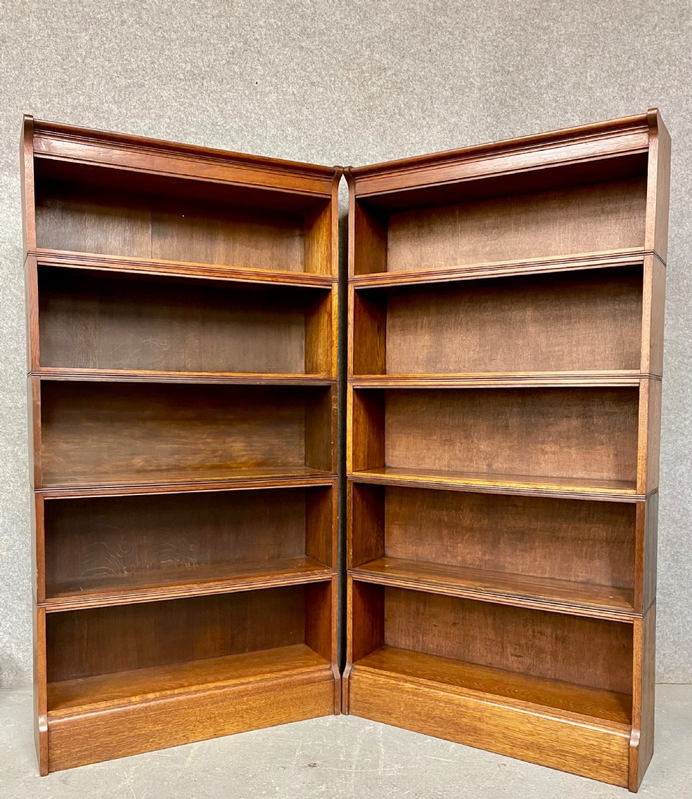 A Pair Of Oak Sectional Open Bookcases By William Baker & Co. Library Furnishers  Of Oxford