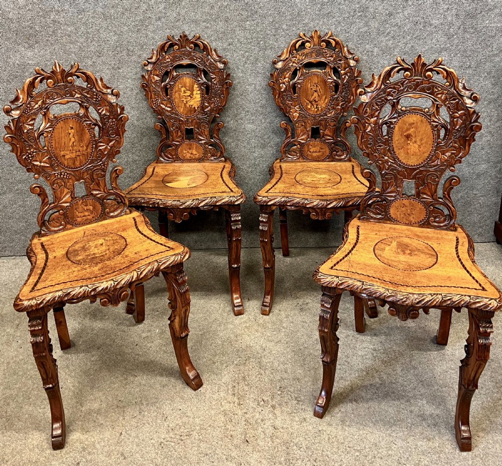 Unusual Set of 4 Black Forest Swiss Chairs
