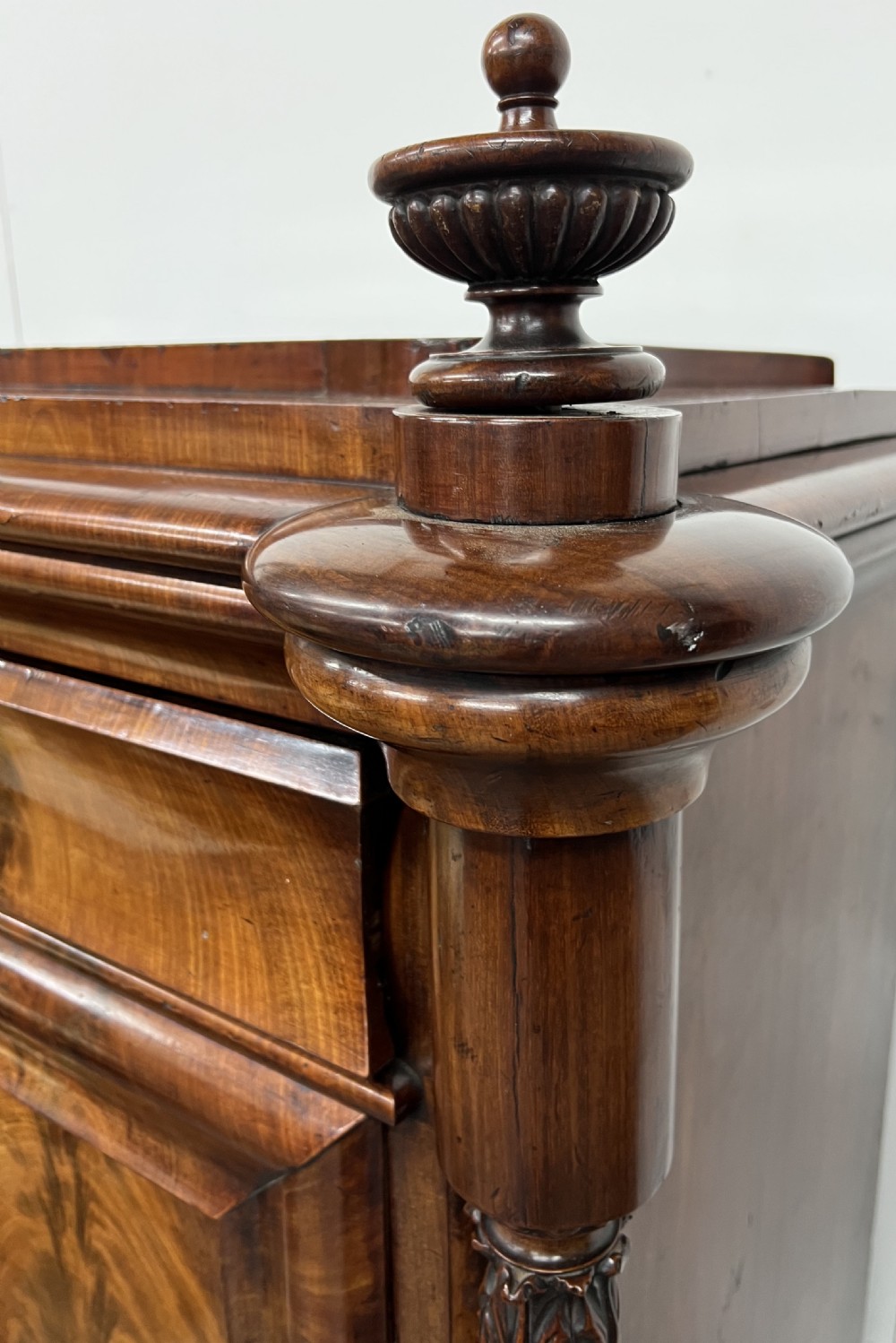 A 19th-century Biedermeier flame mahogany secretaire desk featuring spiralled barley twist columns, a fall-front writing surface, and a fitted interior cabinet. View VI