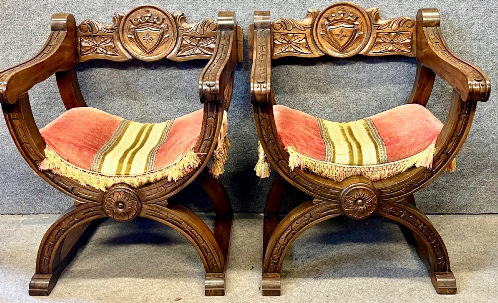 Small Pair of Heraldic Carved Chairs