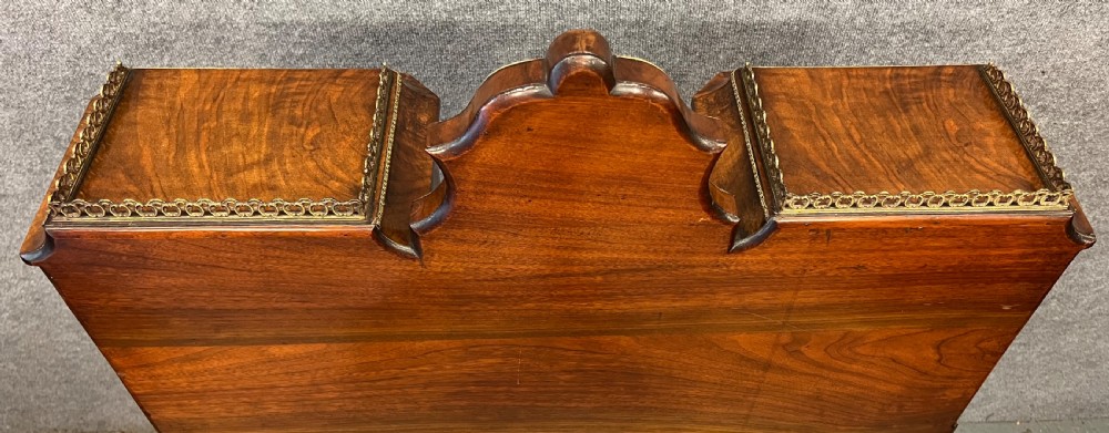 An antique Victorian inlaid walnut bureau de dame featuring a slant-front writing lid, floral marquetry, brass mounts, cabriole legs, and an upper cabinet with glazed doors. View VIII