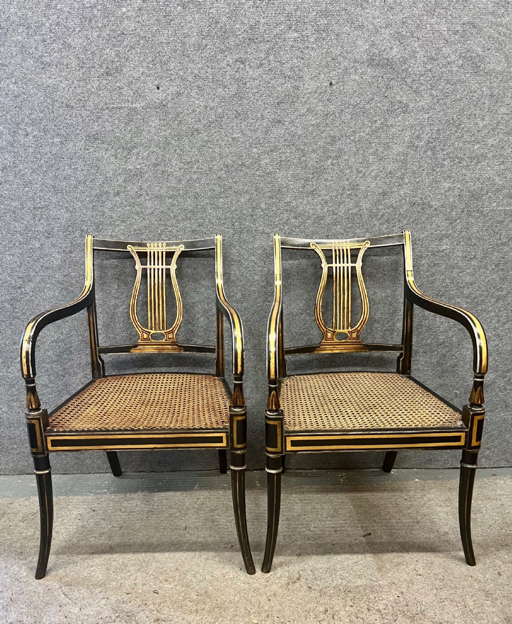 Pair of Painted and Gilded Regency Elbow Chairs