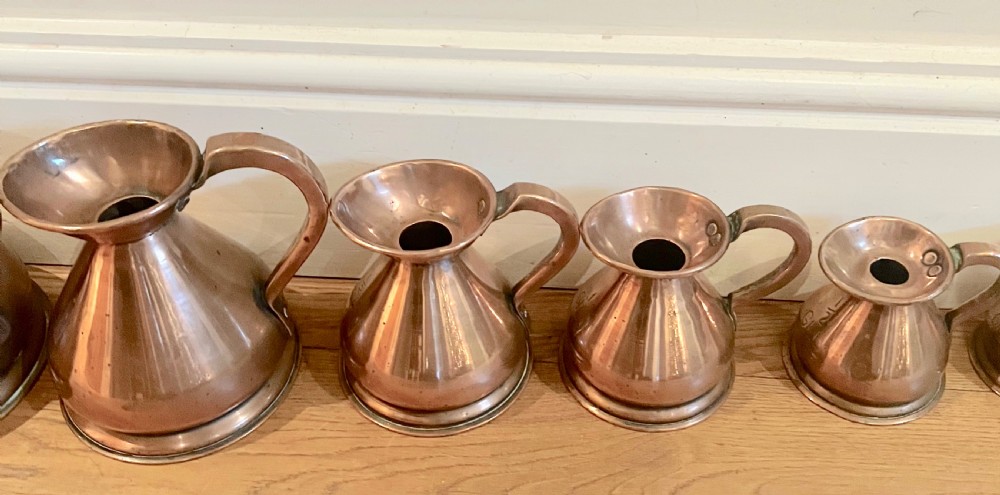 Set of  George V Copper Measure Jugs View XII