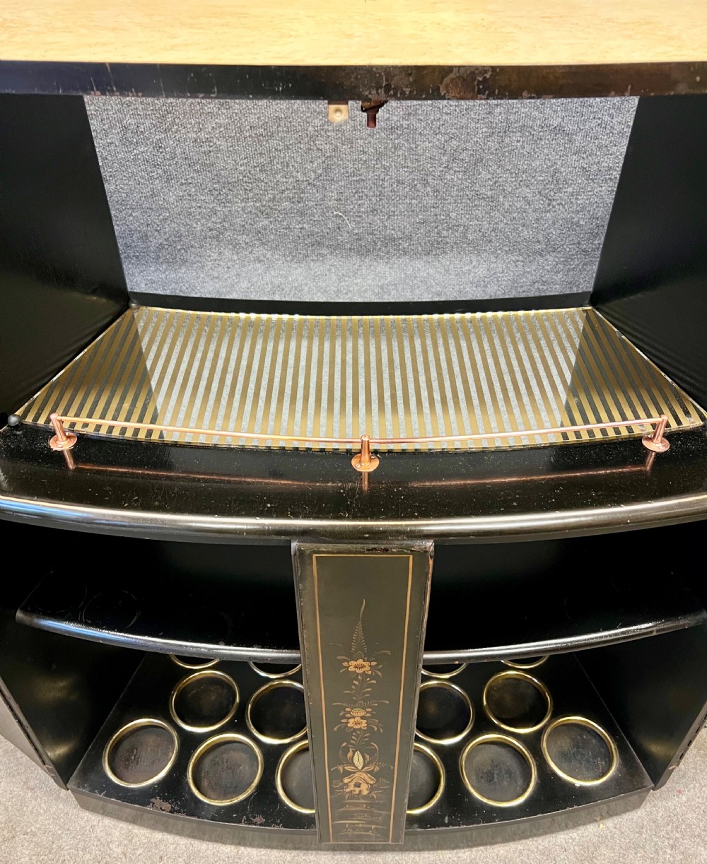 A two-tier black lacquered Art Deco cocktail cabinet featuring hand-painted gold and polychrome Chinoiserie figures and landscapes. View IX