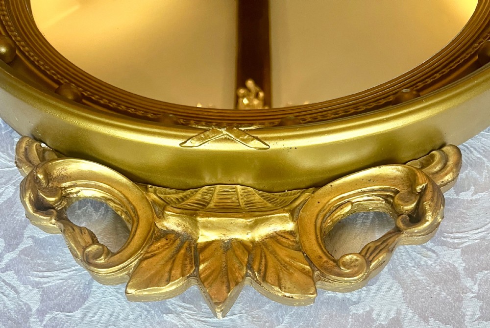 Regency Style Convex carved and Gilded Mirror. View II