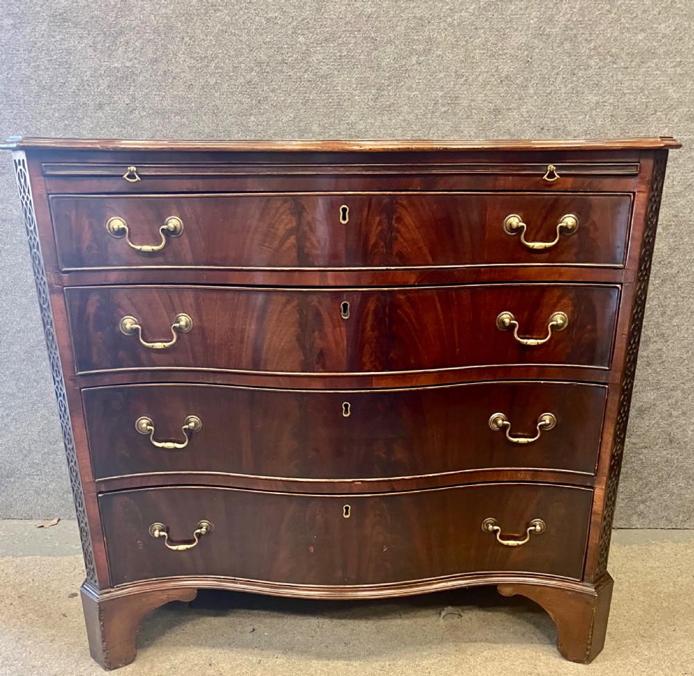 Antique Figured Mahogany Serpentine Shaped Chest of Drawers View II