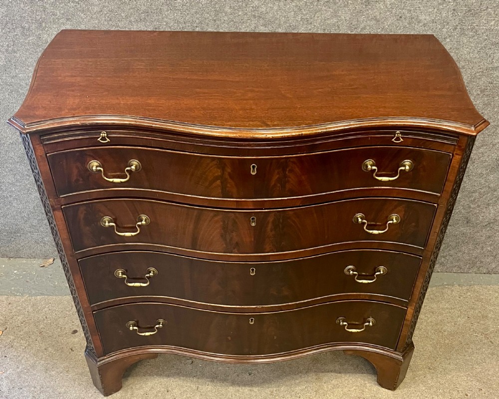 Antique Figured Mahogany Serpentine Shaped Chest of Drawers View III