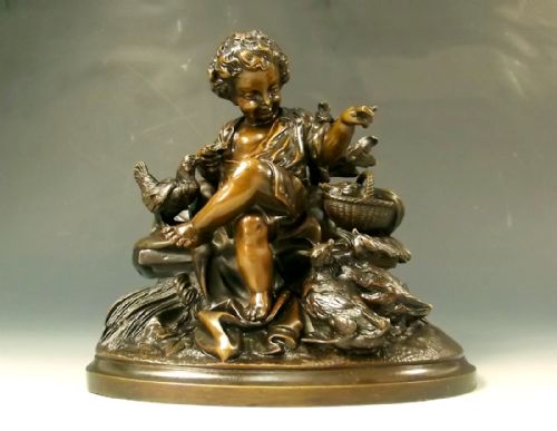 fine french bronze of a boy feeding birds 1860 - CATEGORY: ANTIQUE METAL - DATED 1860