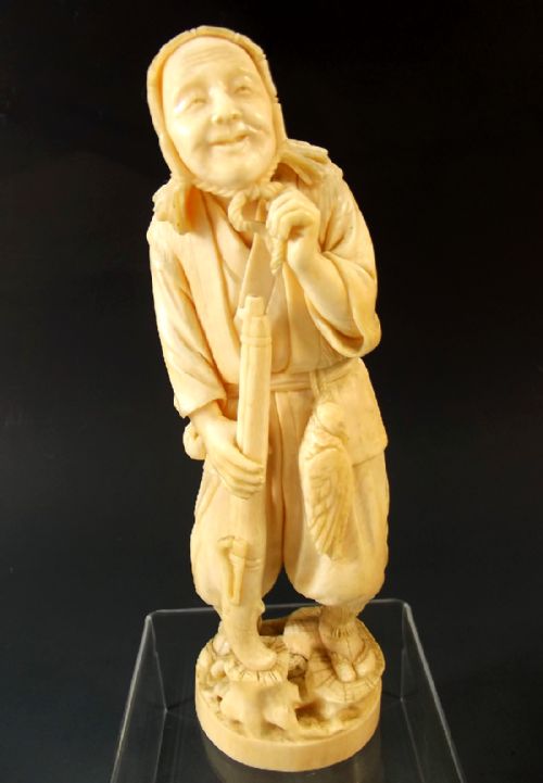 japanese meiji period ivory huntsman okimono - CATEGORY: ANTIQUE MISCELLANEOUS - DATED 1880