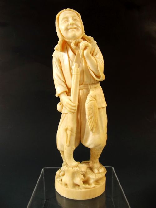 JAPANESE MEIJI PERIOD IVORY HUNTSMAN OKIMONO - ADDITIONAL PHOTO 1