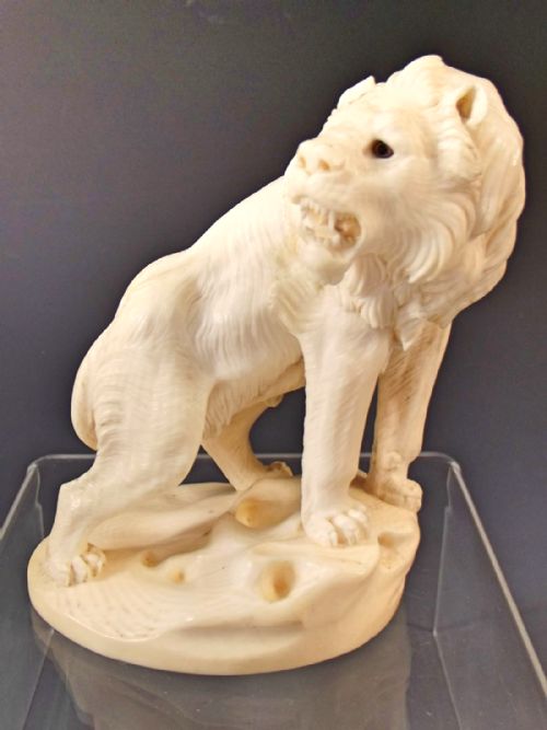 JAPANESE MEIJI PERIOD CARVED IVORY LION OKIMONO - ADDITIONAL PHOTO 1
