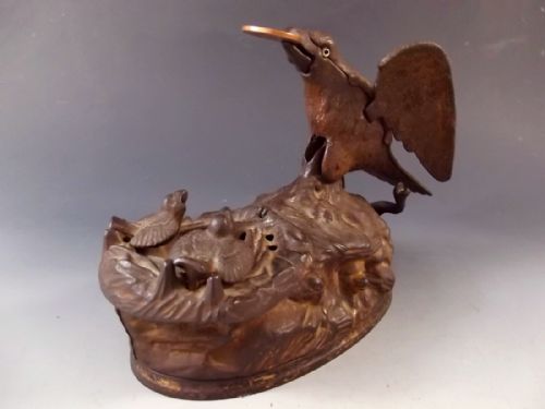 ORIGINAL CAST IRON EAGLE AND EAGLETS MECHANICAL MONEY BANK - ADDITIONAL PHOTO 1